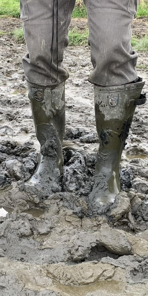 Laarzen in de modder
